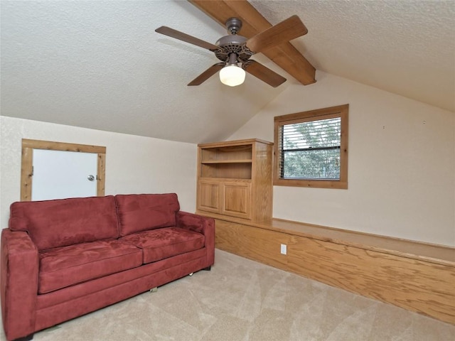 living room featuring ceiling fan, vaulted ceiling with beams, wood walls, light colored carpet, and a textured ceiling