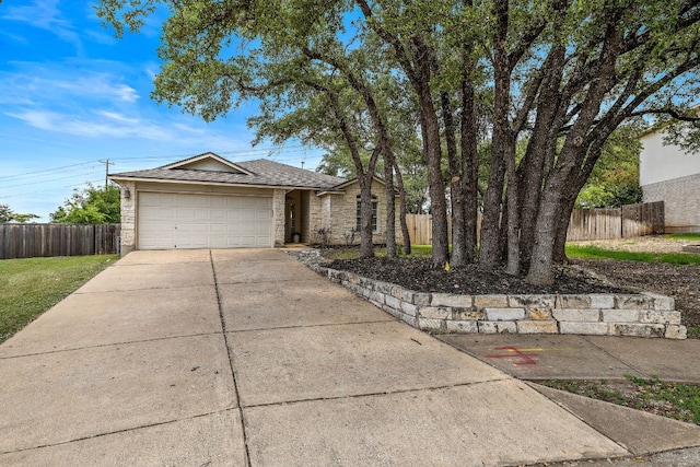 single story home with a garage