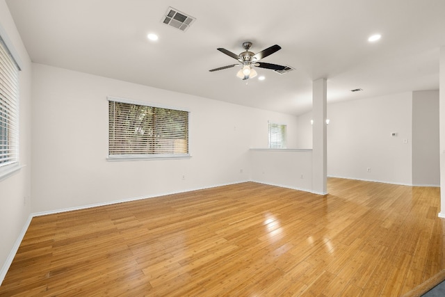 unfurnished room with ceiling fan and light hardwood / wood-style flooring