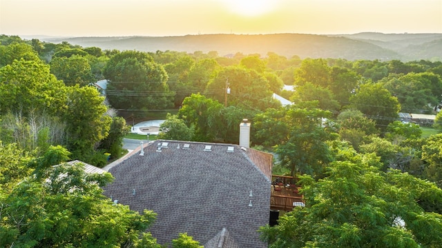 aerial view at dusk with a mountain view