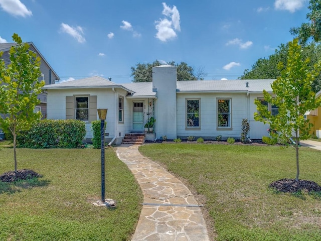 ranch-style house with a front yard