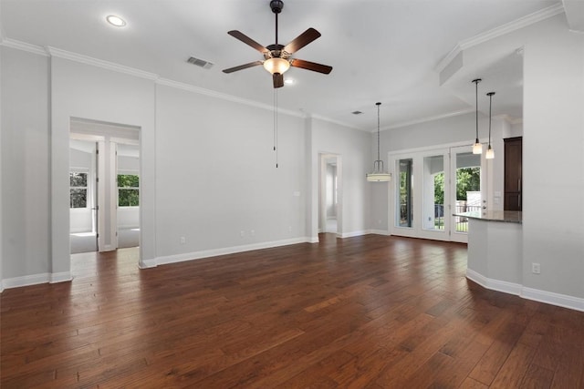 unfurnished living room featuring ceiling fan, dark hardwood / wood-style floors, and crown molding