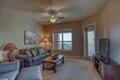 living room with ceiling fan