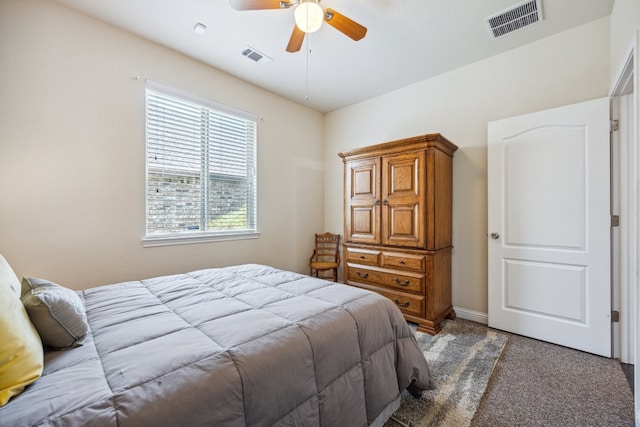 carpeted bedroom with ceiling fan