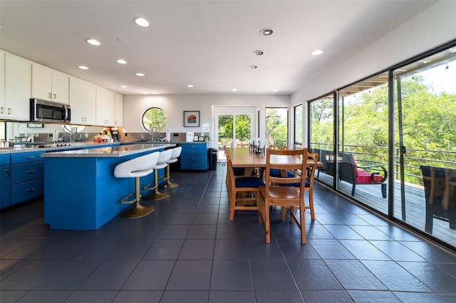 dining room featuring sink