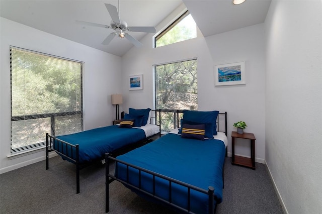 carpeted bedroom with ceiling fan and lofted ceiling