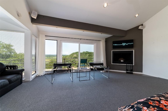 living room with carpet and beam ceiling