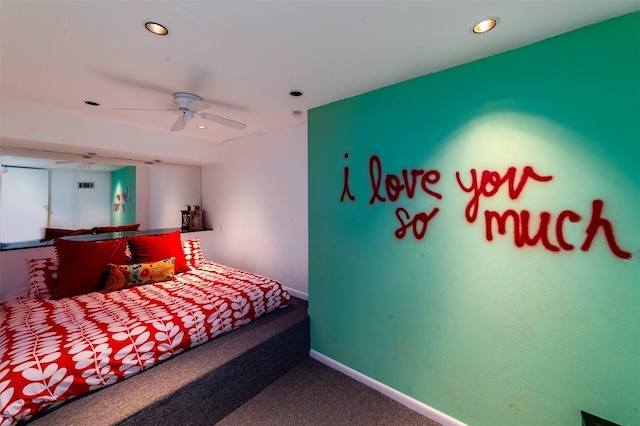 bedroom with ceiling fan and carpet floors