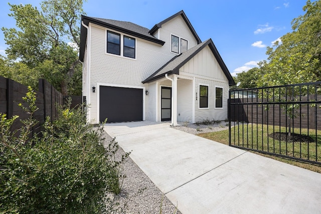 view of front of house with a garage and a front lawn