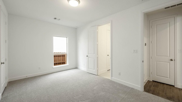 unfurnished bedroom featuring carpet floors