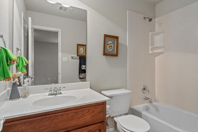 full bathroom with vanity, toilet, and shower / washtub combination