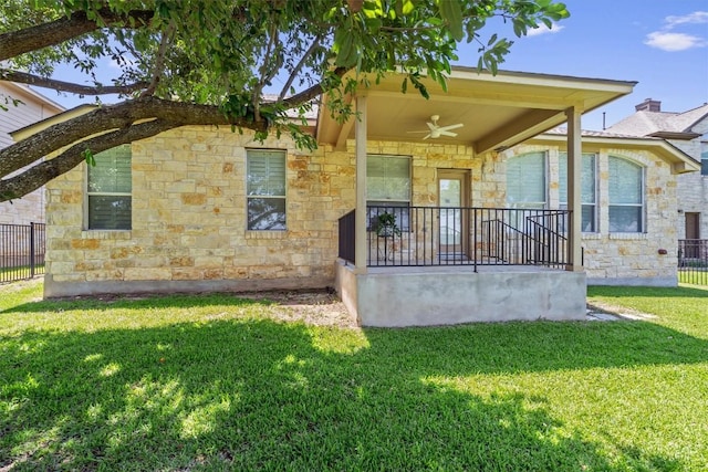 1102 Winding Creek Pl, Round Rock, TX 78665 - exterior space with a porch, stone siding, fence, a ceiling fan, and a front yard