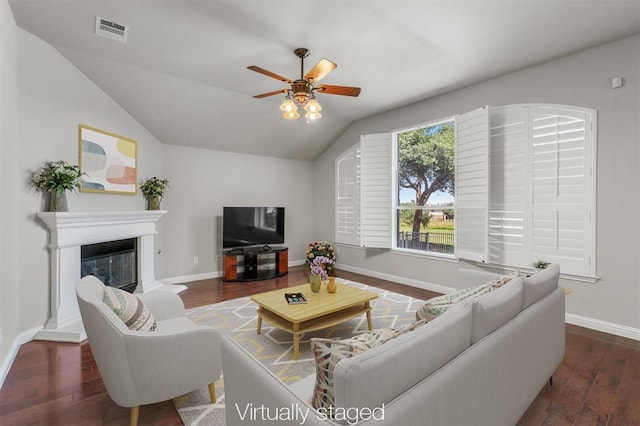 1102 Winding Creek Pl, Round Rock, TX 78665 - living room featuring lofted ceiling, visible vents, a ceiling fan, and wood finished floors
