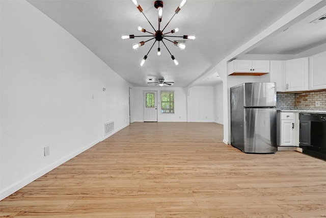 kitchen featuring stainless steel fridge, dishwasher, white cabinets, light hardwood / wood-style floors, and backsplash