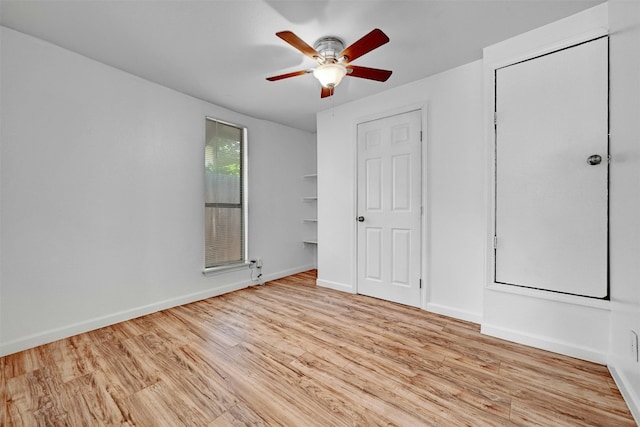 unfurnished bedroom with light wood-type flooring and ceiling fan