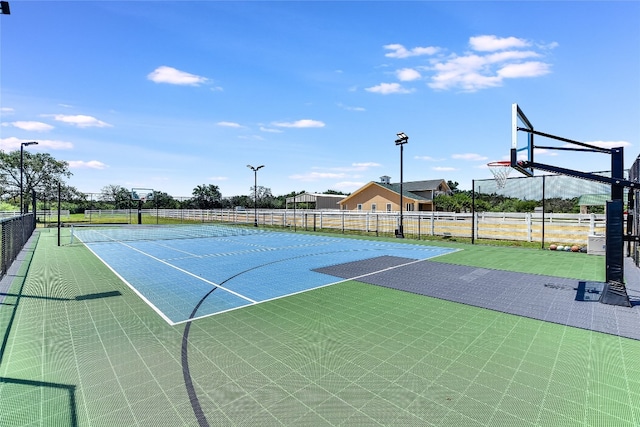 view of sport court with tennis court