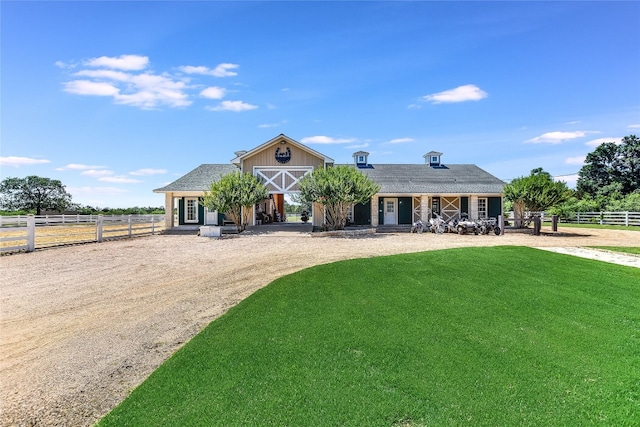 view of front of home with a front lawn