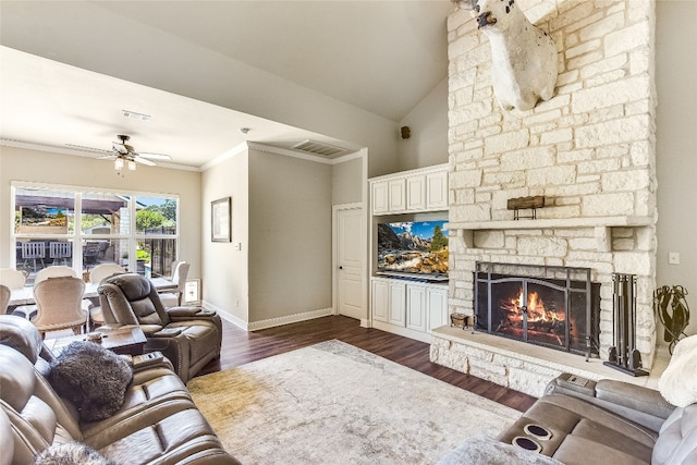 living room with a fireplace, lofted ceiling, ceiling fan, dark hardwood / wood-style floors, and crown molding