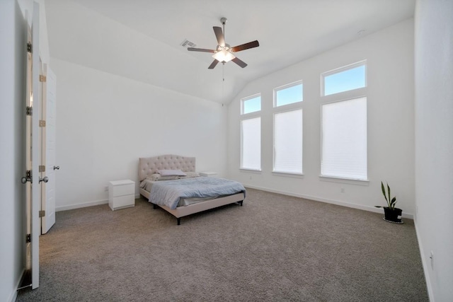 carpeted bedroom featuring ceiling fan and lofted ceiling