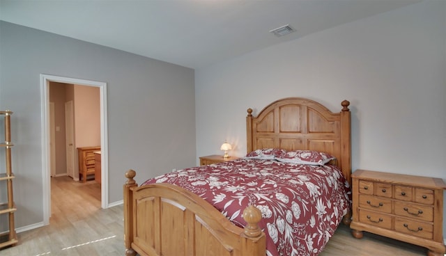 bedroom featuring light hardwood / wood-style flooring