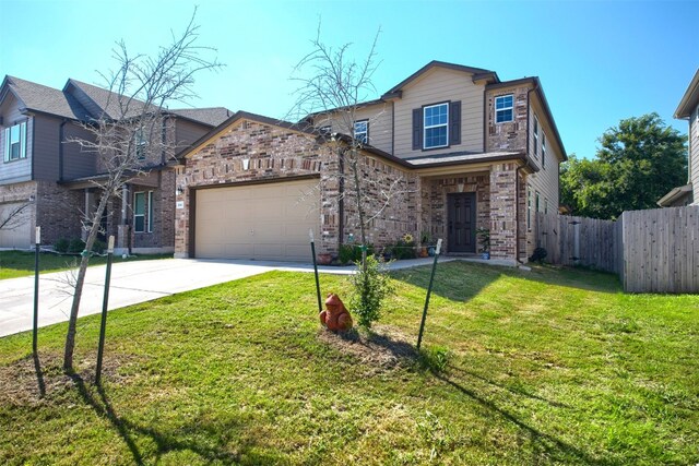 view of front of house with a garage and a front yard