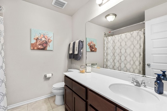 bathroom featuring tile patterned floors, toilet, vanity, and curtained shower