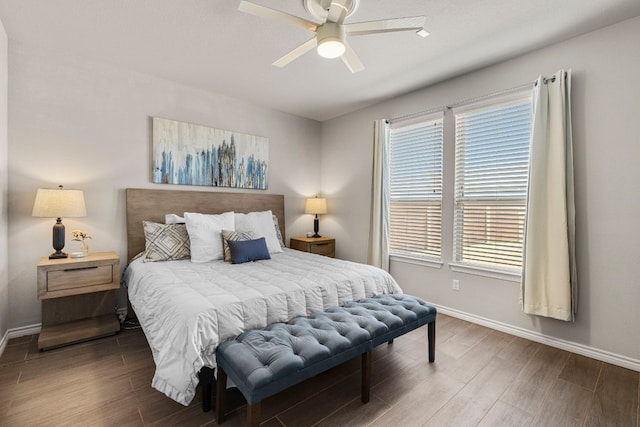 bedroom featuring ceiling fan and dark hardwood / wood-style flooring