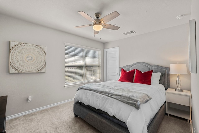 bedroom featuring ceiling fan and carpet floors