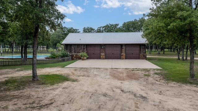 garage with a yard