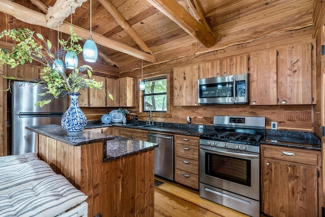 kitchen with sink, stainless steel appliances, vaulted ceiling with beams, light hardwood / wood-style flooring, and wood walls