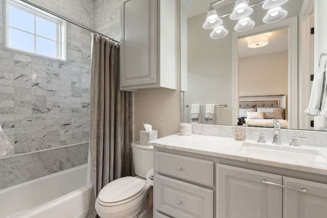 full bathroom with vanity, shower / tub combo, an inviting chandelier, and toilet