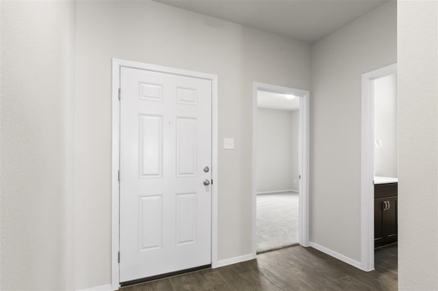 entryway featuring dark wood-type flooring