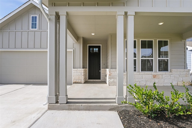 entrance to property featuring a garage