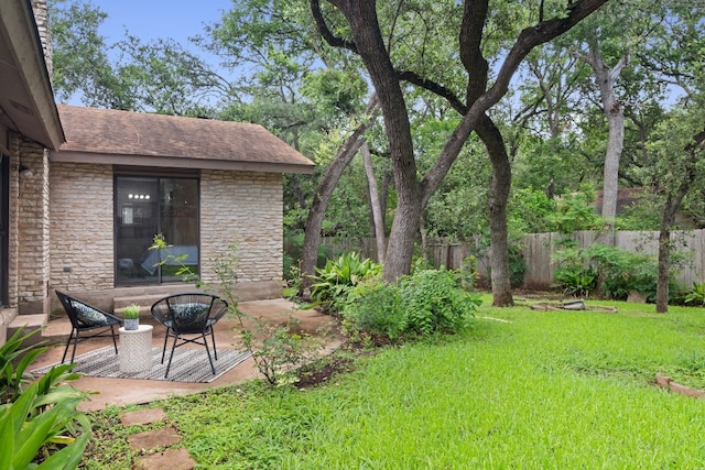 view of yard with a patio area