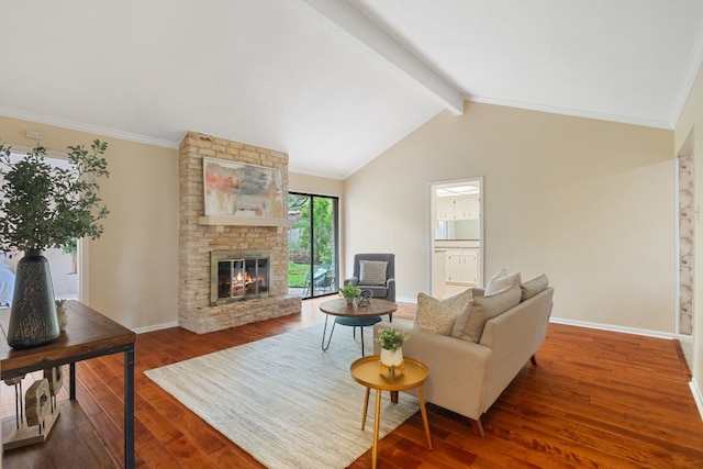 living room featuring crown molding, dark wood-type flooring, a fireplace, and lofted ceiling with beams