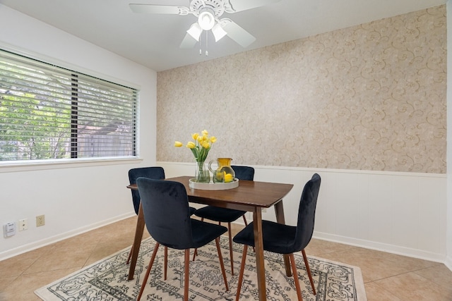 dining room featuring ceiling fan and light tile patterned floors