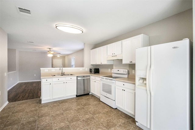 kitchen with kitchen peninsula, ceiling fan, appliances with stainless steel finishes, sink, and white cabinetry