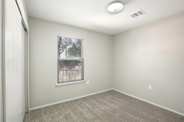 unfurnished room with carpet