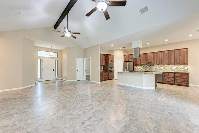 kitchen featuring a kitchen island with sink, high vaulted ceiling, appliances with stainless steel finishes, tasteful backsplash, and beam ceiling