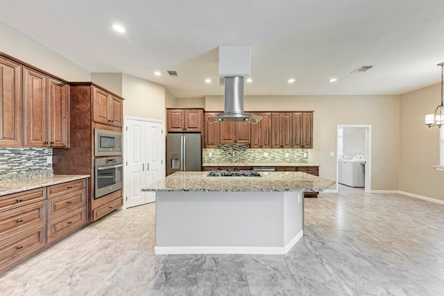 kitchen featuring island exhaust hood, decorative backsplash, a center island, and stainless steel appliances