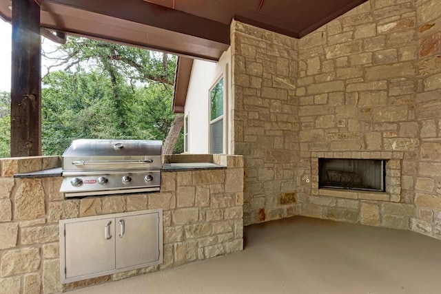 101 Lost Buck, Horseshoe Bay, TX 78657 - view of patio featuring an outdoor stone fireplace