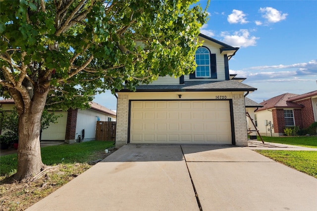 view of front of property featuring a garage