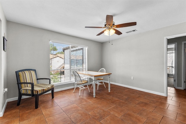 dining area with ceiling fan