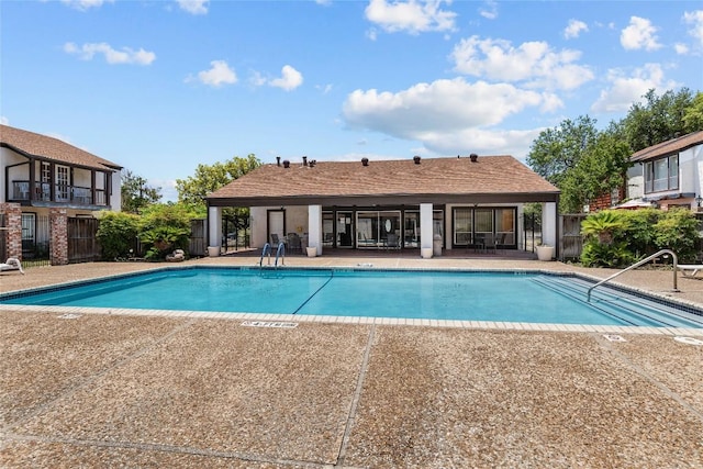 view of pool featuring a patio area