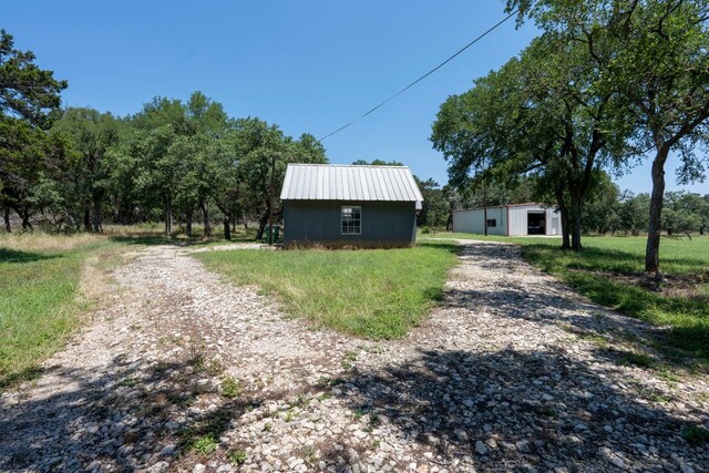 exterior space featuring an outdoor structure