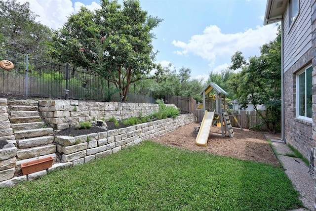 view of yard featuring a playground