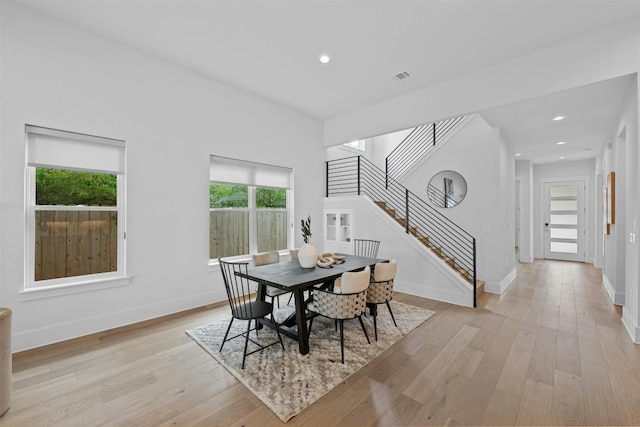 dining area featuring light wood-type flooring