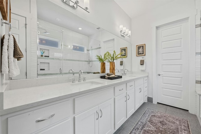 bathroom with vanity and walk in shower