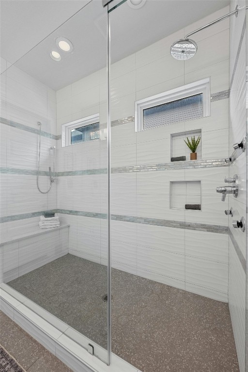 bathroom featuring a tile shower