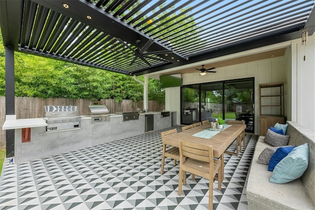 view of patio with grilling area, area for grilling, ceiling fan, and a pergola